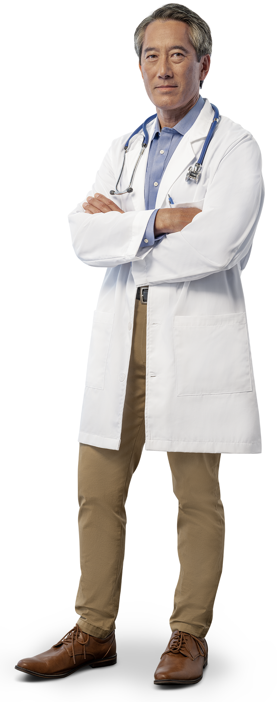 Male doctor standing with arms crossed.